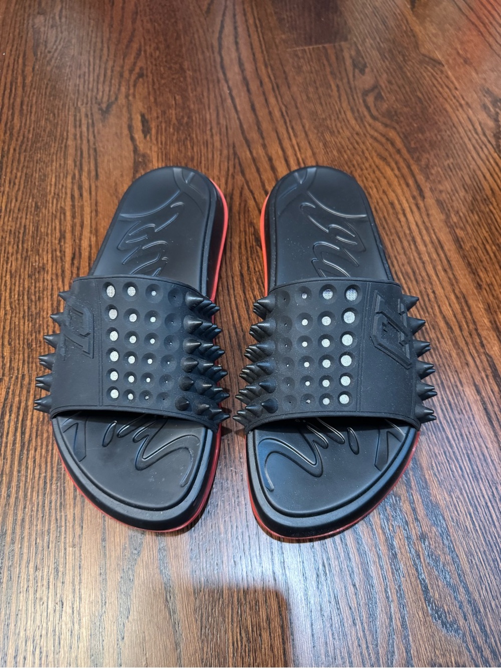 Christian Louboutin Black Slide Sandals with Red Trim and Studded Spikes